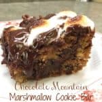 The Chocolate Mountain Marshmallow Cookie Bar is so simple and easy to make. It takes longer to cool off than to make.
