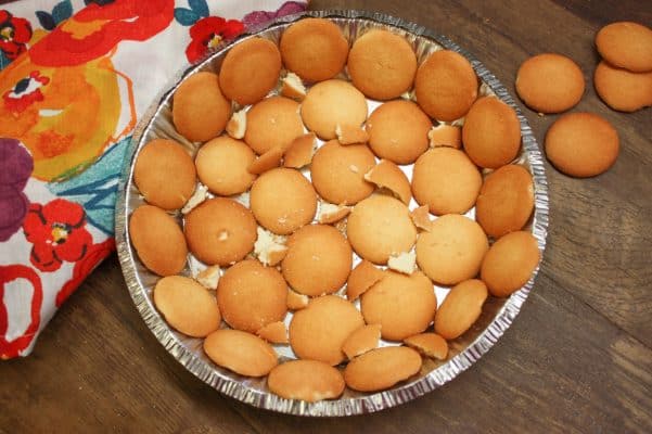 Lemon meringue pie crust made with Nilla Wafers. The wafers are in a metal pie shell.
