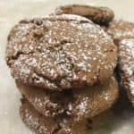 Gingersnap cookies stacked on a counter