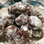 Chocolate Drop Powdered Cookies are a great holiday dessert recipe. They are easy to make and you will have plenty to take to all of your holiday parties.