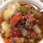 Ground beef and veggies cooked and in a bowl for soup