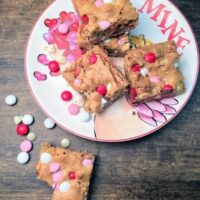 It's Valentine's Day and these blondies are easy to make and the perfect gift for your loved ones. The Valentine's Day Blondie Dessert Recipe is a favorite here at our house and makes the perfect gift for teachers, friends, and loved ones. Be sure to grab the recipe for the Valentine's Day Blondies.