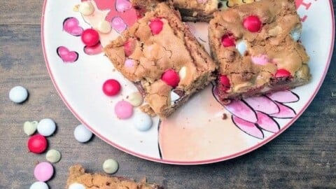 It's Valentine's Day and these blondies are easy to make and the perfect gift for your loved ones. The Valentine's Day Blondie Dessert Recipe is a favorite here at our house and makes the perfect gift for teachers, friends, and loved ones. Be sure to grab the recipe for the Valentine's Day Blondies.
