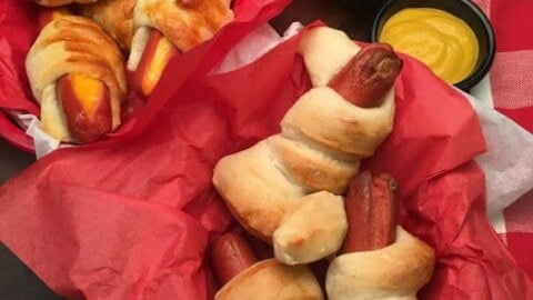 5 Hot Dog Recipes for Parties are the perfect appetizers for any gathering. The hot dog recipes work for football games, birthday parties, and any gathering where you want to offer budget-friendly foods and have something good to eat.