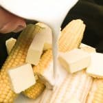 Crock Pot Corn on the Cob with Coconut Milk is an easy recipe. The coconut milk and butter give the corn and soft and buttery taste. The budget-friendly side dish comes out perfect in the slow cooker.