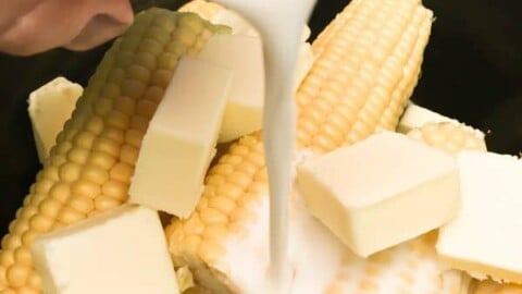 Crock Pot Corn on the Cob with Coconut Milk is an easy recipe. The coconut milk and butter give the corn and soft and buttery taste. The budget-friendly side dish comes out perfect in the slow cooker.
