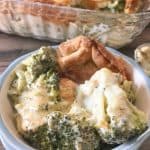Broccoli Cheese Bake in a small dish on the counter