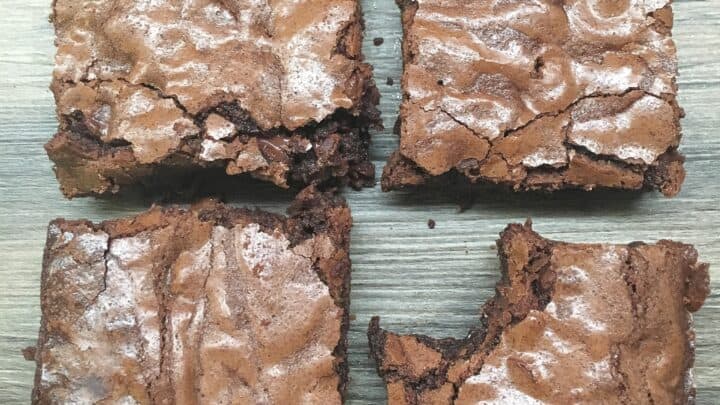 Easy homemade brownies with chocolate chips on a counter.