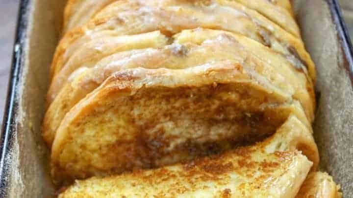 Picture of pumpkin pull apart bread in a glass dish.