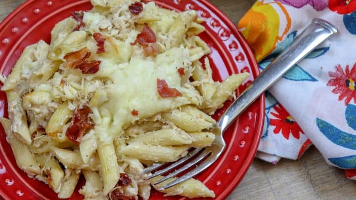Picture of penne pasta on a red plate