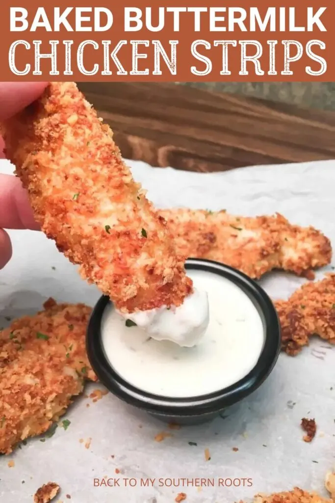 Dipping a chicken strip into sauce