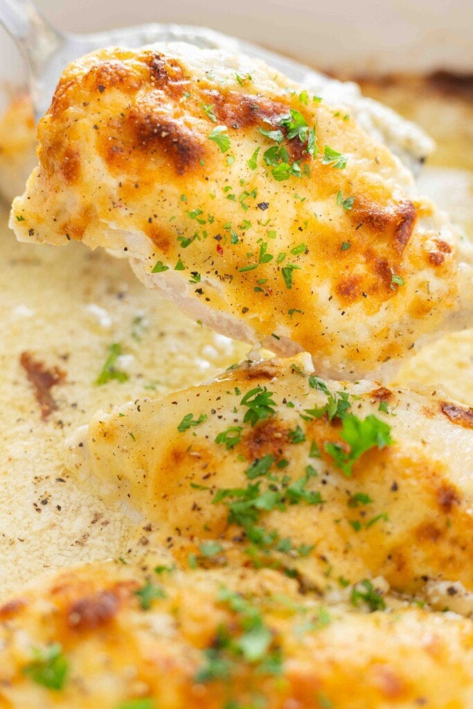 Baked chicken in a casserole dish.