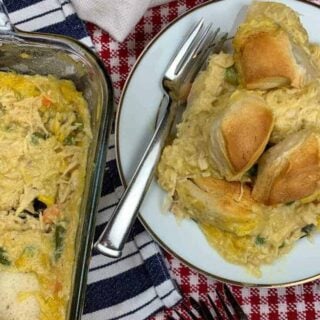 Chicken and biscuits in a casserole dish and on a plate.