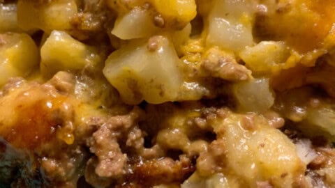 5-ingredient ground beef casserole cooked and on a light blue plate.