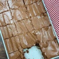Lunch lady brownies in a pan with chocolate frosting