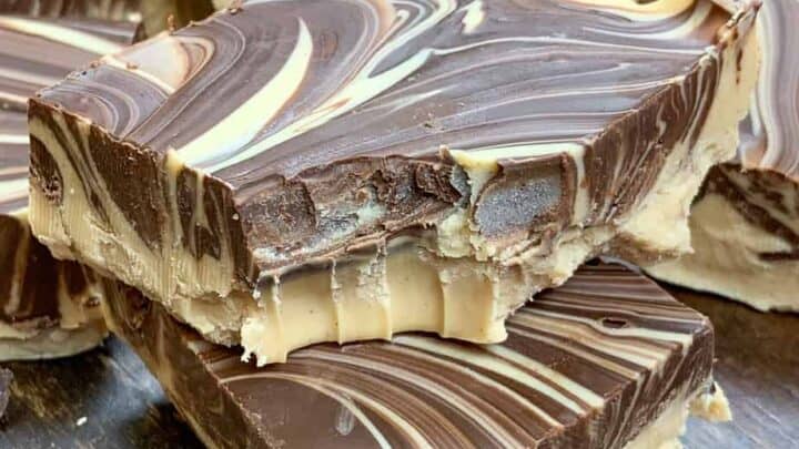 Several pieces of tiger butter fudge sitting in a pile