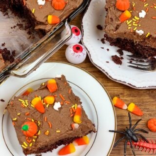 chocolate cake on a plate with Halloween decorations