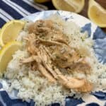 Chicken and rice on a plate.