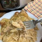 Creamy ranch chicken and potatoes on a fork