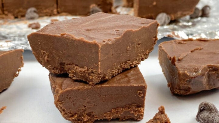 Easy two ingredient fudge sliced and stacked on top of each other.
