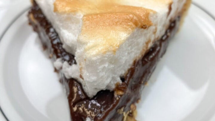 Chocolate Pie sliced and on a plate.