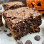 Cream cheese pumpkin swirl brownies on the counter.