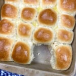 Homemade yeast rolls in a baking dish.
