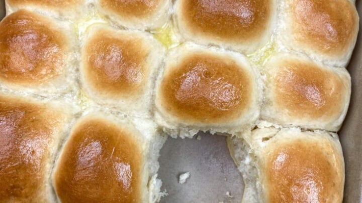 Homemade yeast rolls in a baking dish.