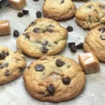 Salted caramel chocolate chip cookies on the counter.