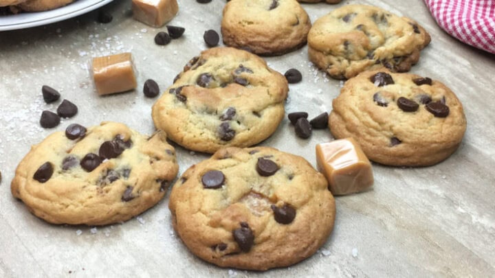Salted caramel chocolate chip cookies on the counter.