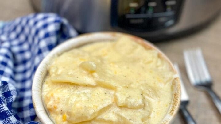 Cheesy au gratin potatoes in a bowl.