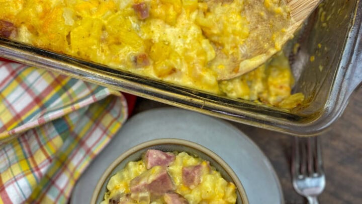 Ham and potato bake with cheese in a bowl and casserole dish.