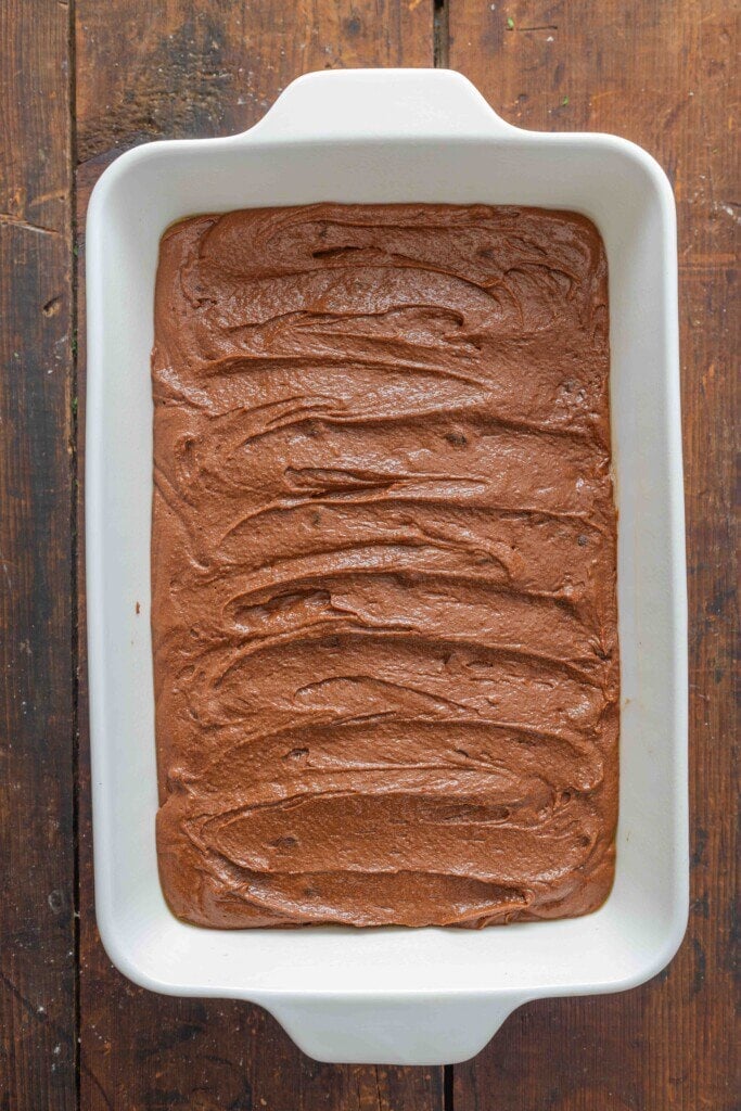 brownie batter in a baking dish.