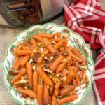 Cooked carrots in a Christmas bowl.