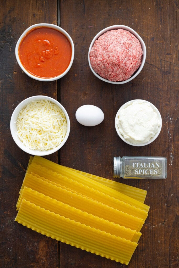 Ingredients for lasagna on a counter.
