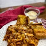 Crock Pot lasagna on a white plate.