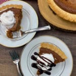 Peanut butter pie with chocolate drizzled on top.