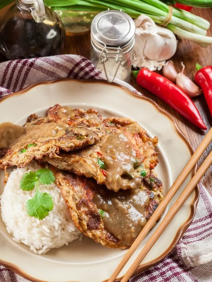 Egg foo young on a plate.