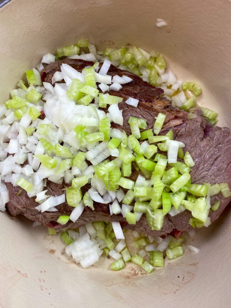 chuck roast with veggies in a pot