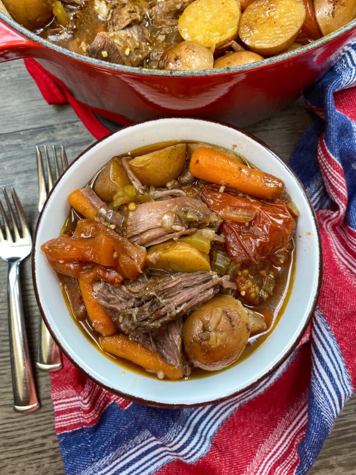 Pot roast in a white bowl