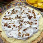 Pineapple pie with pecans on top.