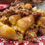 sloppy joe tater tot casserole on a red plate
