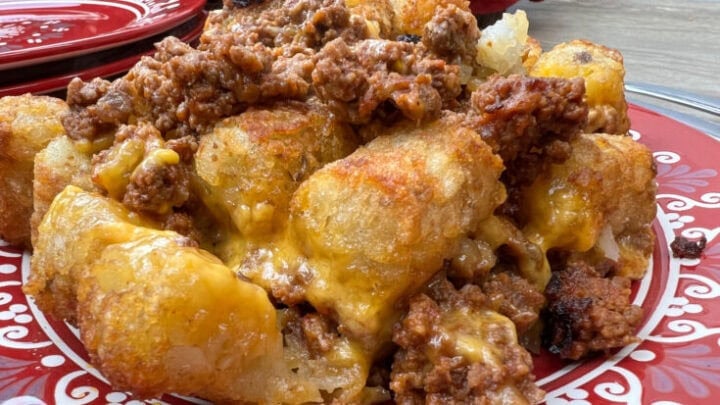 sloppy joe tater tot casserole on a red plate