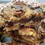 Pecan pie bars stacked on top of each other.