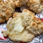 Three ingredient biscuits with melting butter on top.