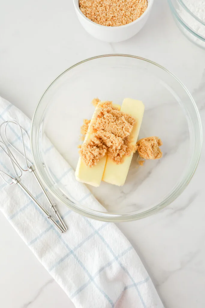 Brown sugar and butter in a large mixing bowl
