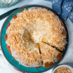 Louisiana crunch cake with a slice cut out.