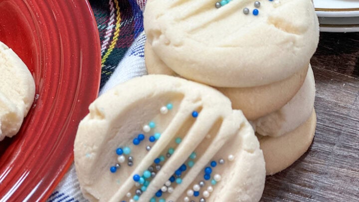 Shortbread cookies on the counter. The cookies are stacked on top of each other.