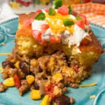 Cowboy casserole on a blue plate.