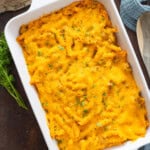 ground beef penne pasta bake in a casserole dish.